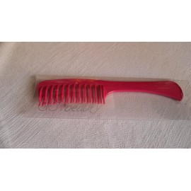 Гребінець із подвійними зубцями з ручкою.