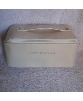 Косметичка зі шкірозамінника з ручкою