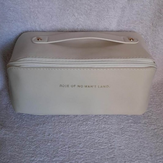 Косметичка зі шкірозамінника з ручкою